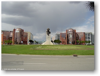 roundabout with statue of don juan de borbn y battenberg in madrid, spain