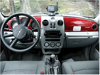 [ interior of our rental PT cruiser with GPS ]